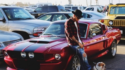 Lewis Hamilton Takes His Bulldog For a Spin In His Classic Mustang GT500